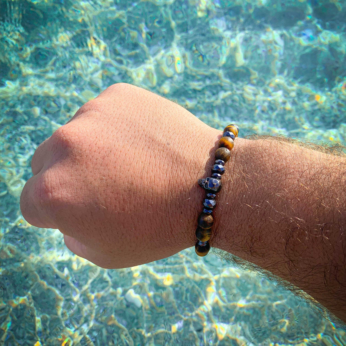 Lagao // Matte Tiger Eye Faceted Hematite Skull